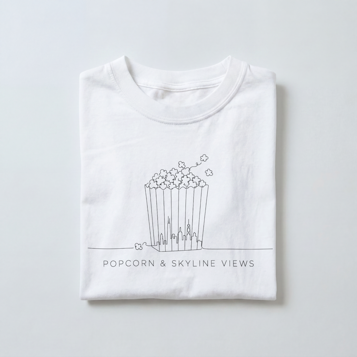 Popcorn & skyline views tee